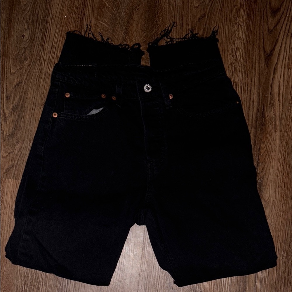 Black High-Waisted Levi’s Denim Jeans